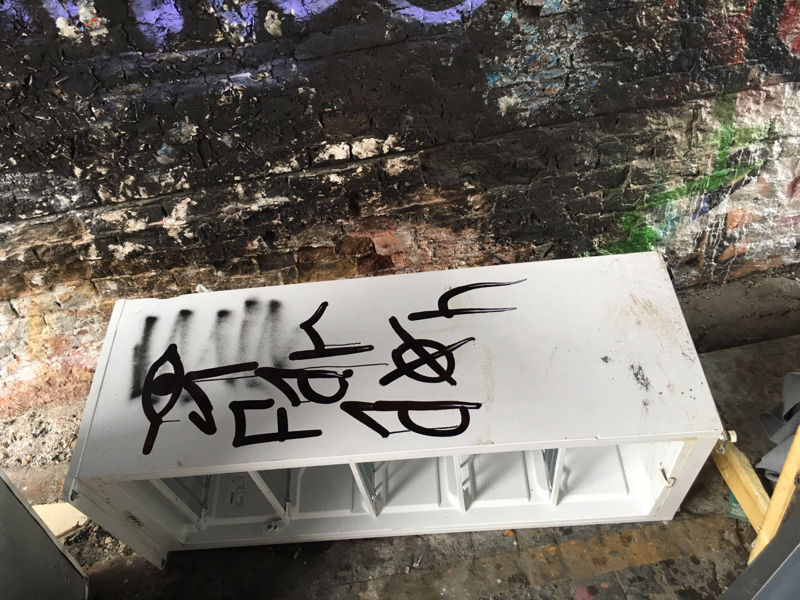 Findaskip dumped fridge with graffiti