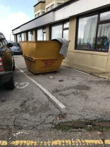 picture of a skip in carpark